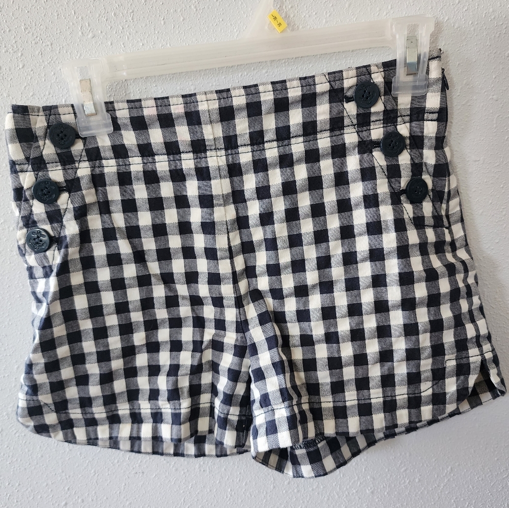 LOFT size 0 navy and white sailor button side zip shorts.